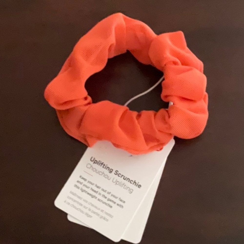 Lululemon uplifting Scrunchie in bright orange